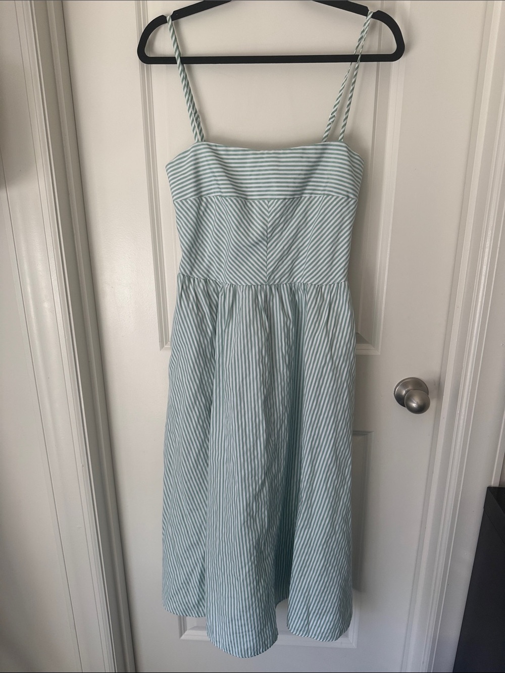 Green and white striped dress